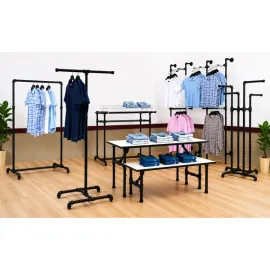 Industrial pipe fixtures matte black white raw steel retail store outriggers racks faceouts hangrails